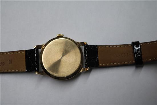 A gentlemans 9ct gold Tudor manual wing wrist watch, with subsidiary seconds, on later associated strap.